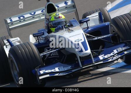 (dpa) - German Formula One pilot Ralf Schumacher races in his BMW-Williams during the first free practice session at the Hockenheim racetrack, Germany, 1 August 2003. The German Formula One Grand Prix will take place in Hockenheim on Sunday, 3 August. Stock Photo