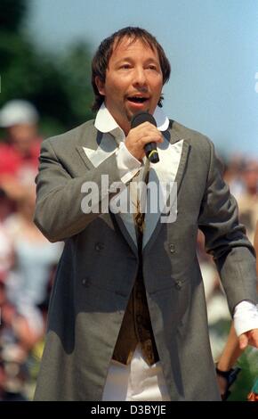 (dpa) - The Swiss pop star DJ Bobo, with civil name Rene Baumann, performs in Mainz, Germany, 12 July 2003. With his song 'Chihuahua' he has landed a summer hit which stormed the charts in many European countries. On the Eurocharts the song is currently ranking on second place. Stock Photo