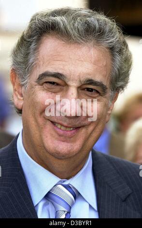 (dpa) - Spanish star tenor Placido Domingo smiles in Haeusern, a village in the Black Forest, Germany, 22 July 2003. The maestro came to Germany to attend the final of the Operalia newcomer competition for young opera singers, a competition which was initiated by Domingo. Stock Photo