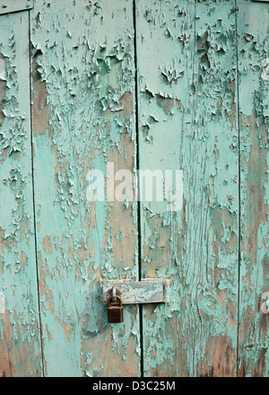 TURQUOISE PEELING PAINT ON WOOD BACKGROUND Stock Photo - Alamy