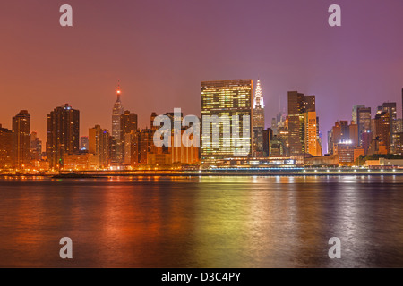 Mid Town Manhattan Skyline, New York City At Dusk Stock Photo