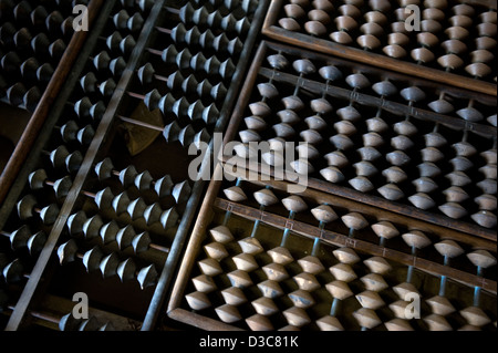 Pattern of old traditional wooden soroban, or abacus, used by school students to calculate mathematic problems. Stock Photo
