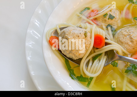 Chicken soup with meat balls and noodles. Stock Photo