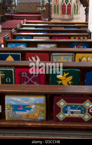 Pews and hassocks in All Saints Church, Church Lench, Worcestershire, UK Stock Photo