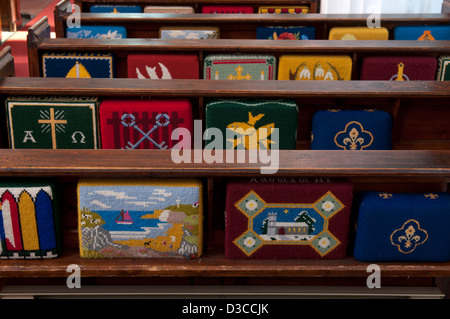 Pews and hassocks in All Saints Church, Church Lench, Worcestershire, UK Stock Photo