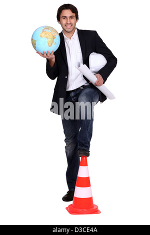 Architect holding globe Stock Photo