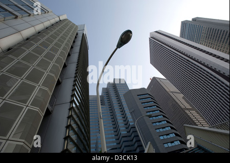 Corporate headquarter office skyscrapers fill the Tokyo skyline of the commercial business district of West Shinjuku. Stock Photo