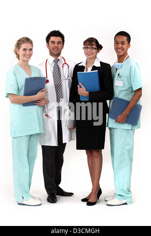 hospital workers posing together Stock Photo