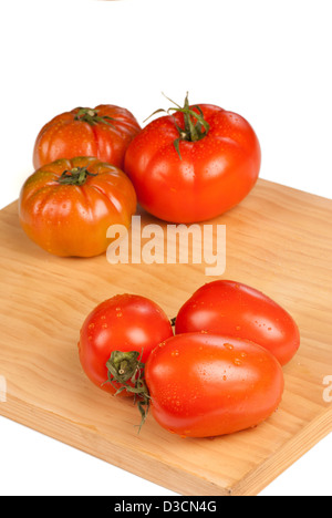 Pear tomatoes and some more standarly shaped ones Stock Photo