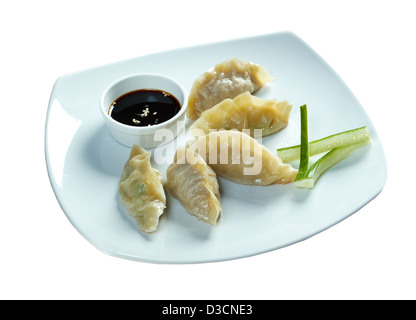 Dim-sum call Gyoza, asian tradition food.Fried Dumplings Chinese Style ..isolated on white background. clipping Path  Stock Photo