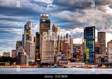 The Skyline of Sydney CBD office buildings at sunset - Circular Quay Sydney Australia Stock Photo