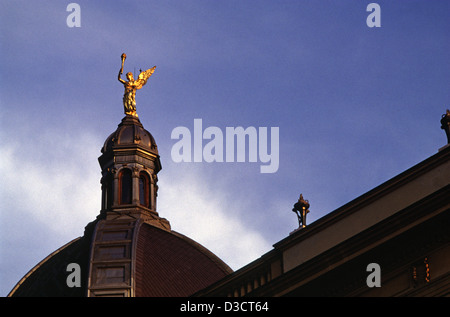 Dome with angel statue on roof of Starcevicev Dom building built for Ante Starčević who was a controversial politician and writer who is credited with having laid the foundations for Croatian nationalism. Today the building houses the city library. Zagreb, Croatia Stock Photo