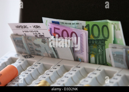 Hamburg, Germany, Euro banknotes, coupon and Coin Counting Stock Photo