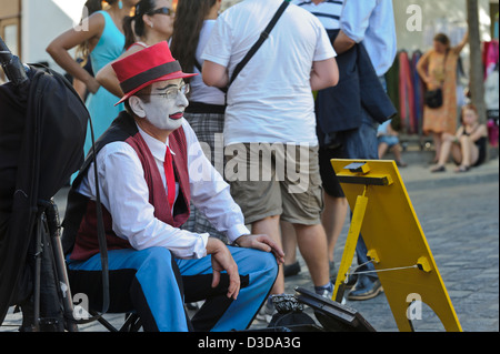Mime street performer having a break, Paris, France. Stock Photo