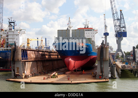 Rotterdam, The Netherlands, a container ship is in dry dock the port of Rotterdam Stock Photo