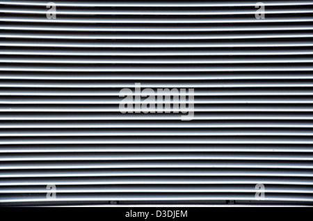 External wall air conditioner vent. Op art effect. Stock Photo
