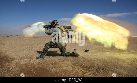 A US special forces soldier fires a Carl Gustav recoilless rifle during weapons practice on a firing range February 16, 2013 in Helmand province, Afghanistan. Stock Photo