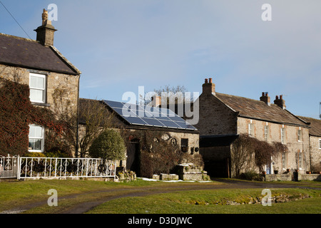 Detached houses with Solar Panels, in the village of Bellerby, Near Leyburn and Catterick, North Yorkshire, UK Stock Photo
