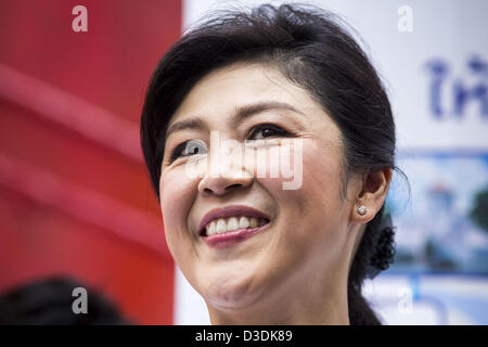 Feb. 17, 2013 - Bangkok, Thailand - Thai Prime Minister YINGLUCK SHINAWATRA campaigns for Pongsapat Pongchareon in Bangkok Sunday. Pol General Pongsapat Pongcharoen, a former deputy national police chief who also served as secretary-general of the Narcotics Control Board is the Pheu Thai Party candidate in the upcoming Bangkok governor's election. (He resigned from the police force to run for Governor.) Former Prime Minister Thaksin Shinawatra reportedly recruited Pongsapat. Most of Thailand's reputable polls have reported that Pongsapat is leading in the race and likely to defeat Sukhumbhand  Stock Photo