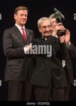 Former Soviet officer Stanislav Petrov holds the 'Dresden Prize' in front of ZDF journalist and laudatory speaker Claus Kleber (L) in the Semper Opera in Dresden, Germany, 17 February 2013. The prize is worth 25,000 euros. The alarm was signalled while he was on duty at the command center for the Soviet Air Defence Forces on 26 September 1983. The 73 year-old judged the alarm to be a false alarm preventing a nuclear attack on the USA. Photo: OLIVER KILLIG Stock Photo
