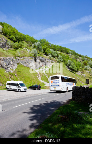 A motorhome and holiday coach in Cheddar Gorge, Somerset, England, UK Stock Photo