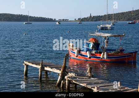 Quiet bay with fishing boat in the Pagasitic Gulf Stock Photo