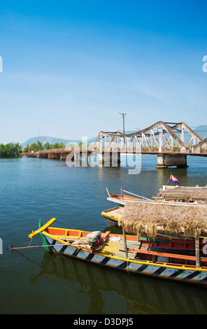 Kampot bridge and boat in cambodia Stock Photo