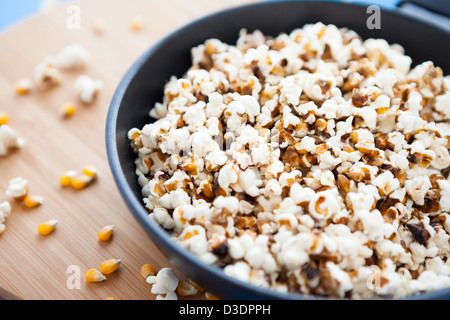 Popcorn cooked in a frying pan, closeup Stock Photo