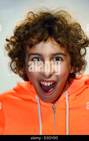 Boy is screaming with joy Stock Photo