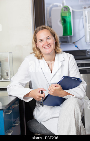 Portrait of a female scientist smiling Stock Photo