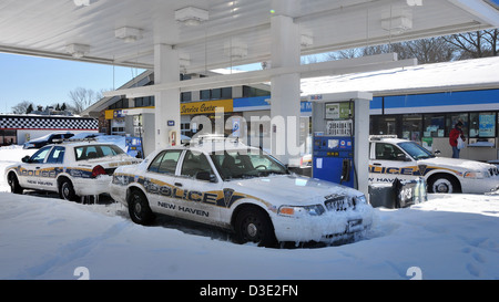 New Haven police cars left during the storm along Whalley Avenue after Nemo, one of the worst storms in CT history. Stock Photo