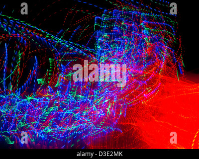 Blurred movement effect of overhead illuminated street decoratios - France. Stock Photo
