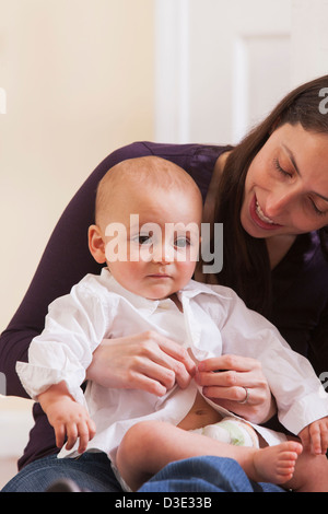 changing clothes mother son munich bavaria bedroom cute germany alamy