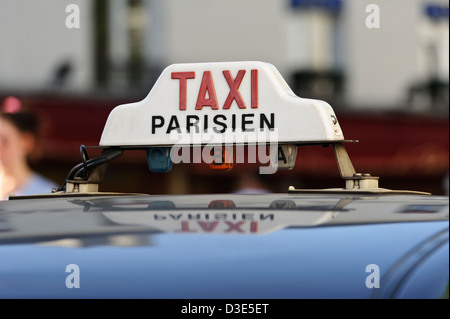 Parisien Taxi sign, Paris, France.