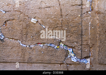 Hundreds of prayers crammed in the cracks of the Western Wall that only God knows Stock Photo