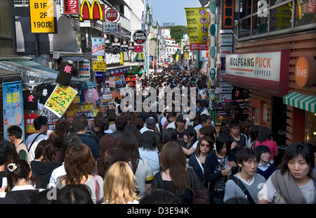 Packed with young shoppers is the famous Takeshita-dori Street in the fashionable and trend-setting Harajuku district of Tokyo. Stock Photo