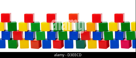 Plastic color blocks. Old toys - seamless row isolated on white background Stock Photo