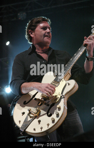Charlie Burchill of Simple Minds playing at Ashton Court festival, Bristol Stock Photo