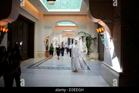 Walkway in the Atlantis Palm Hotel Dubai UAE with shoppers Stock Photo