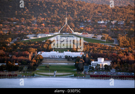 Autumn colours surround the Provisional Parliament House and Parliament House Capital Hill Canberra Australia Stock Photo