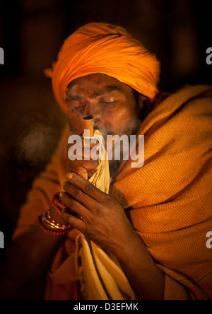 sadhu mela naga kumbh india smoking pot allahabad maha alamy