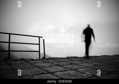 Man jumping into the void Stock Photo