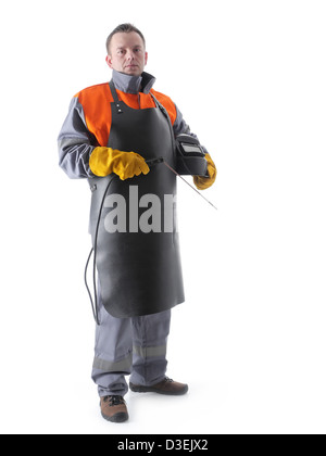 Portrait of welder wearing protective welding black leather apron, welding hood and welding electrode holder over white