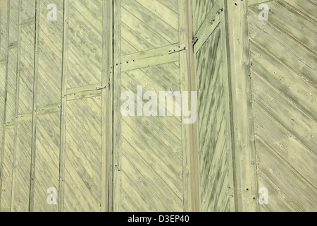 second world war aircraft cantilevered wooden hanger doors at Duxford Imperial War Museum Cambridgeshire England UK Stock Photo