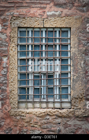 A barred window from the Hagia Irene Mosque in Istanbul, Turkey. Stock Photo