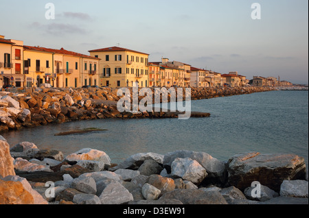 Marina di Pisa sunset view of the town's waterfront street. Relaxing evening landscape on the coast of Italy. Stock Photo