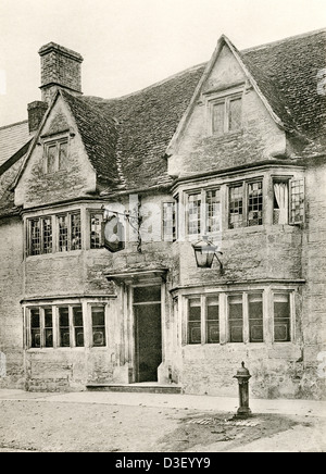 A collotype plate entitled ' The Swann Inn, Lechlade, Glos.' scanned at high resolution from a book published in 1905. Stock Photo