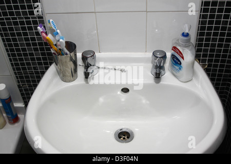 Domestic wash hand basin in toilet Stock Photo