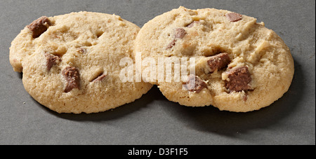 Two milk chocolate chunk cookie biscuits Stock Photo