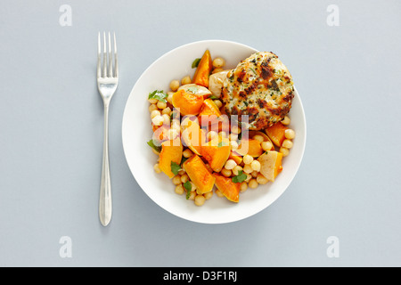 Salmon fish cakes patty butternut squash chickpeas Stock Photo